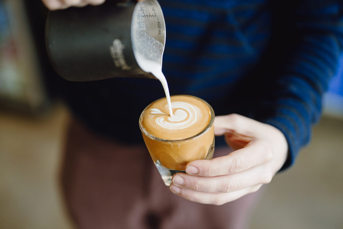 serving coffee at Little Wolf Coffee one of the restaurant Options around Ipswich and Essex