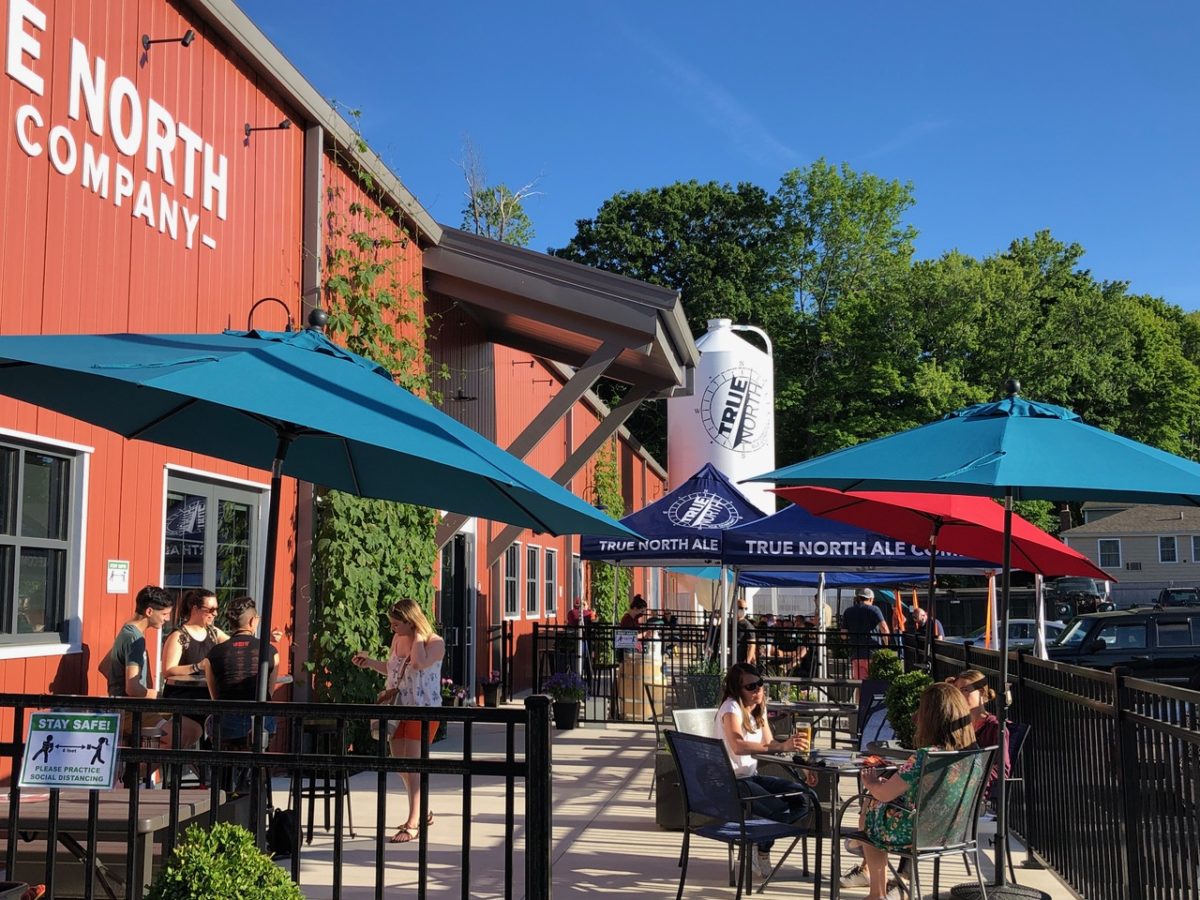 people dining al fresco at True North Ale Company