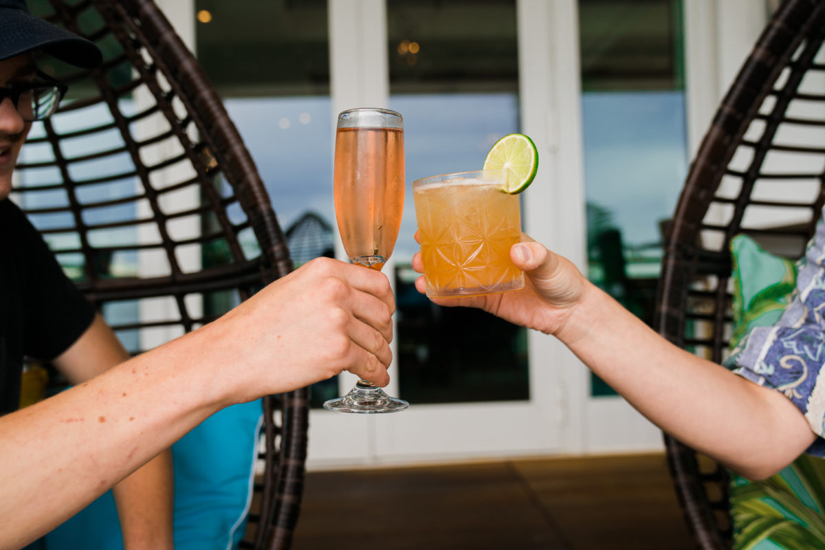 two people drinking at 1606 at the Beauport Hotel